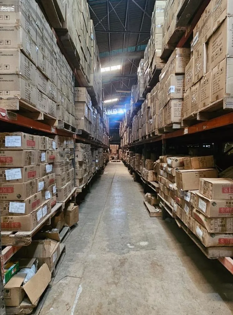 Racked and palletised stock inside the Bagumbayan warehouse